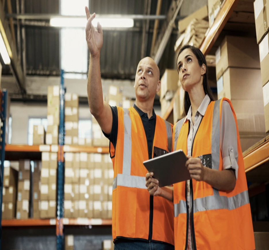 Warehouse workers with safety equipment